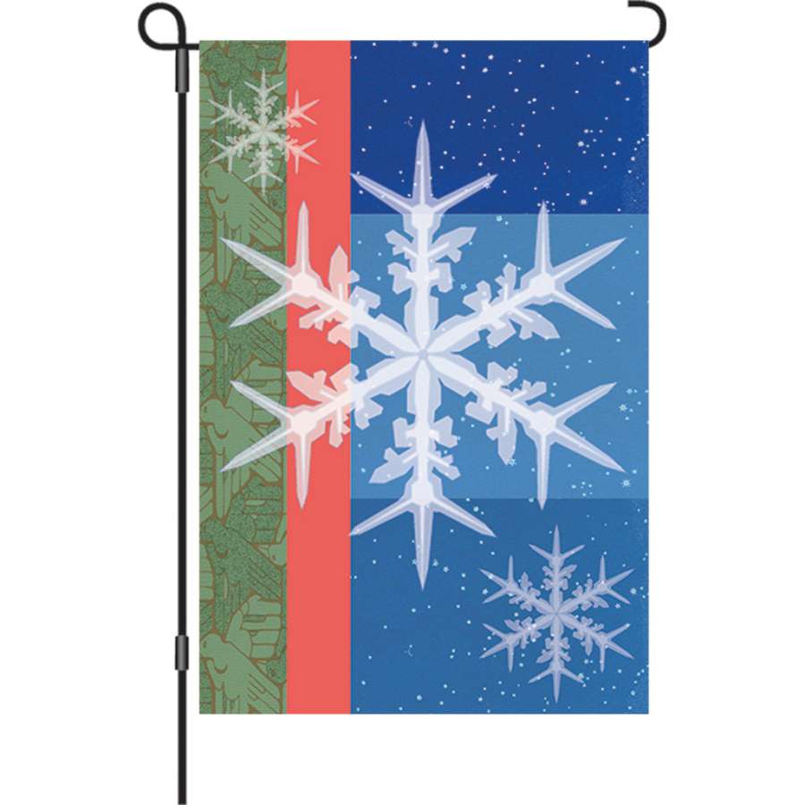 Illuminated 12 in. Snowflakes Garden Flag displayed outdoors featuring intricate snowflake designs against a winter backdrop.