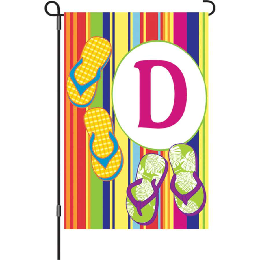 12 in. Summer Monogram Flag - D, featuring a stylish letter design, displayed in a vibrant garden setting on a flag pole.