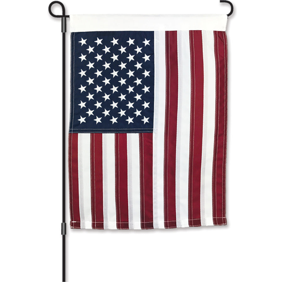 12 in. United States Applique Flag USA featuring detailed stars and stripes displayed proudly in a garden setting.