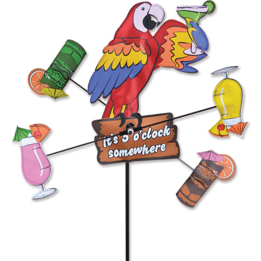 12 in. WhirliGig Spinner with Island Parrot design, colorful and spinning in a gentle breeze, adding charm to an outdoor space.