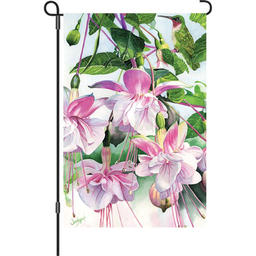 12-inch illuminated Window on the World garden flag in a vibrant design, displayed in an outdoor garden setting with a soft glow at dusk.
