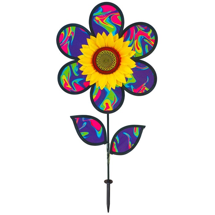 12\" Blue Psychedelic Sunflower garden spinner with colorful petals in motion, surrounded by greenery, enhancing outdoor aesthetics.