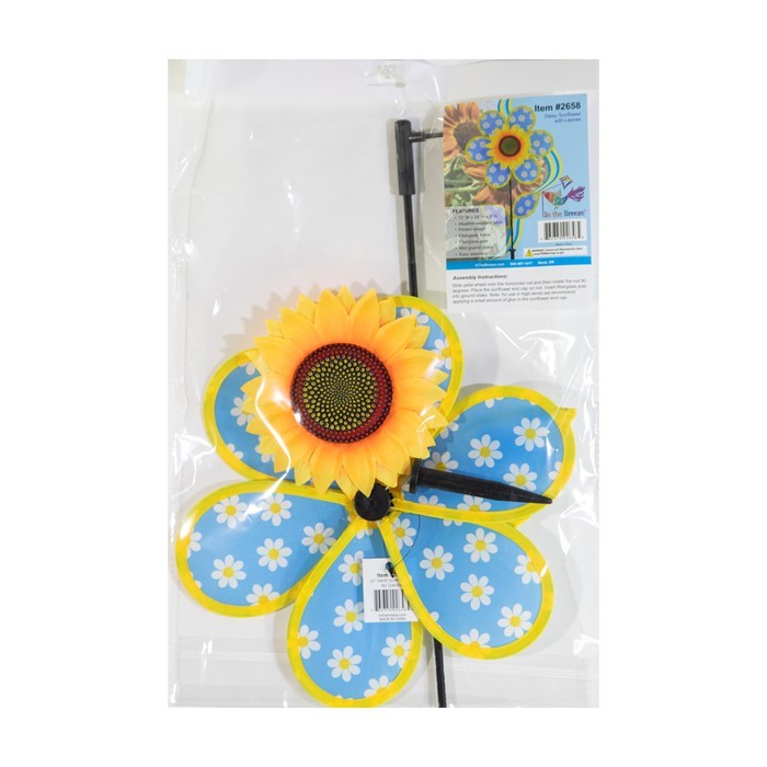 12-inch Daisy Sunflower Spinner with six blue petals and sunflower center spinning in the breeze, displaying colorful garden decor.