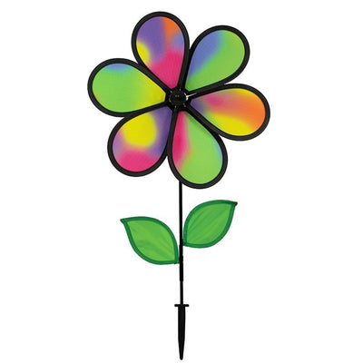 12-inch Jewel Flower spinner with colorful petals and leaves attached to a sturdy fiberglass pole, twirling beautifully in a garden setting.