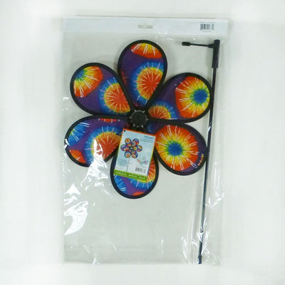 12-inch Tie Dye Flower garden spinner with colorful petals spinning in the breeze on a fiberglass pole, enhancing garden decor's vibrancy.