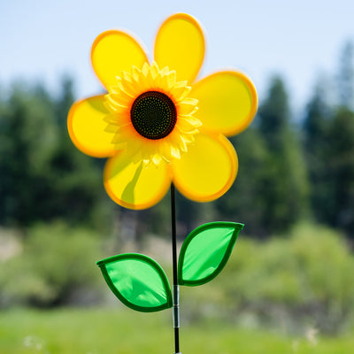 12" yellow sunflower spinner with bright petals and green leaves, designed to spin in the breeze for colorful outdoor decoration.