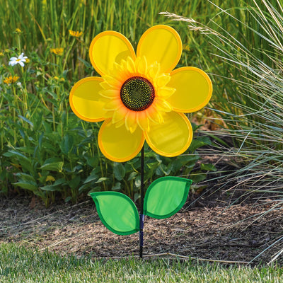12" yellow sunflower spinner with bright petals and green leaves, designed to spin in the breeze for colorful outdoor decoration.