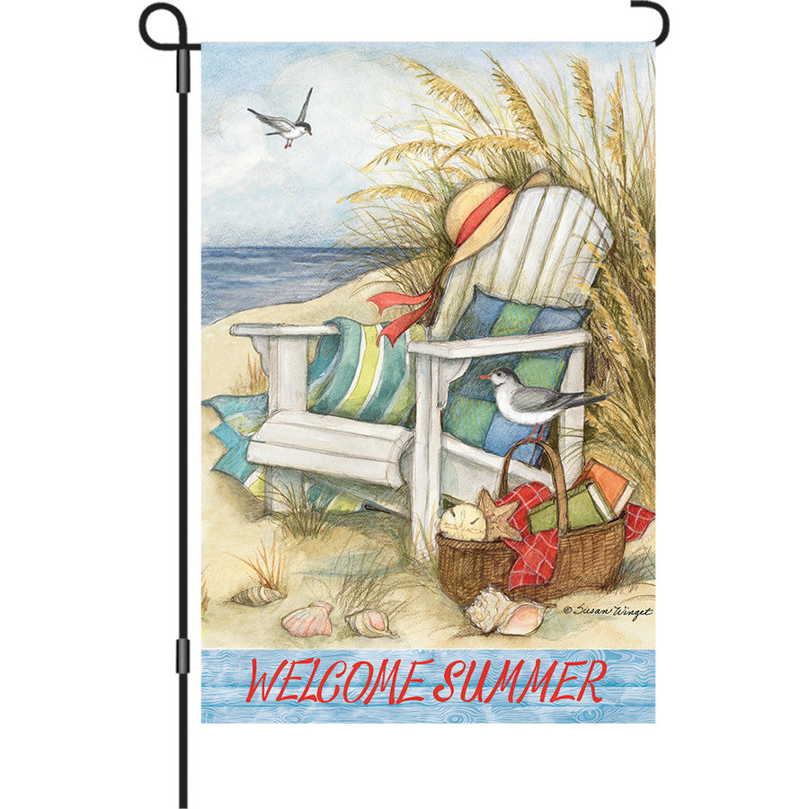 13 in. Elite Oversized Garden Flag showcasing a colorful Beach Chair design displayed on a garden flag pole in a vibrant outdoor setting.