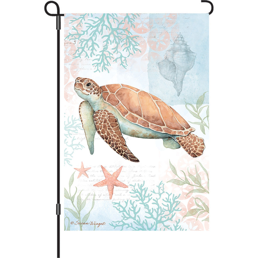 13 in. Elite Oversized Garden Flag featuring a vibrant sea turtle design against a bright background, gently billowing in an outdoor setting.