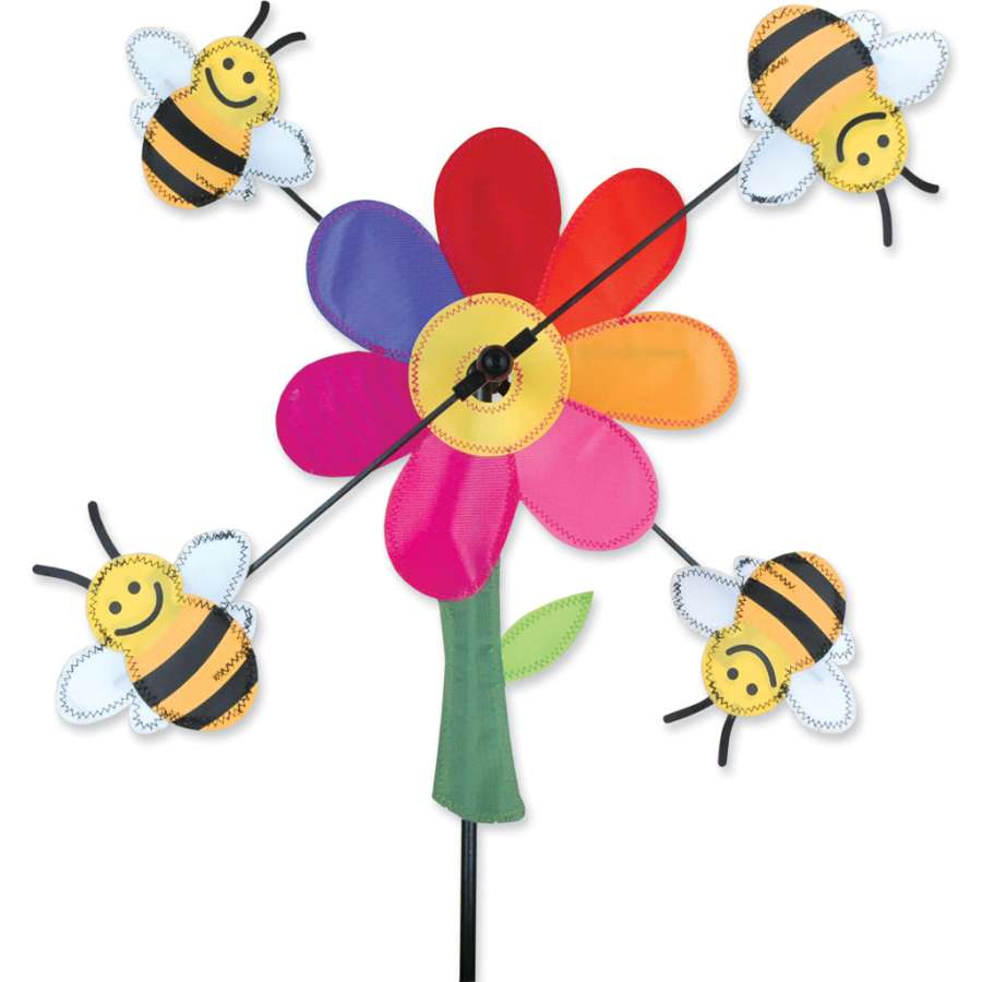 13 in. bumble bee WhirliGig Spinner spinning in a garden, showcasing vibrant colors and a whimsical design against a sunny backdrop.