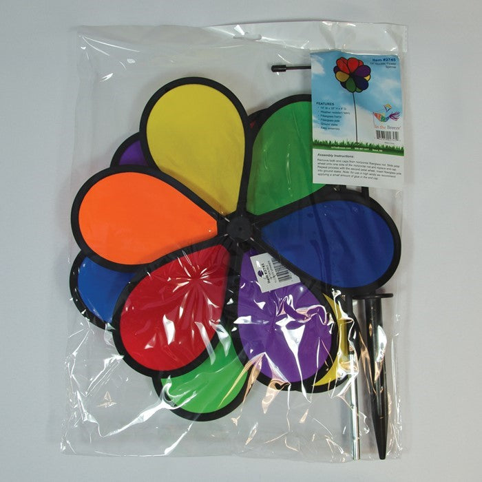 14" Double Flower Spinner features two rainbow-colored flower wheels spinning in opposite directions, adding dynamic decor to any garden.