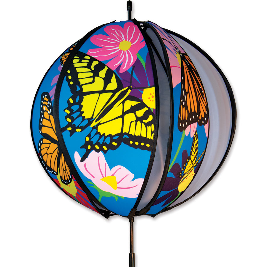 15 in. Ball Spinner featuring colorful butterfly design, displaying vibrant flowers and butterflies in a garden setting, spinning gracefully in the breeze.