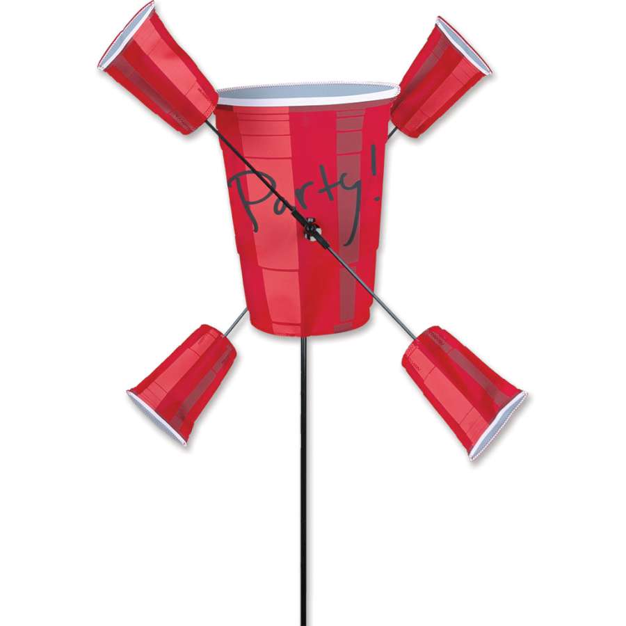 15 in. WhirliGig Spinner with humorous themes spinning in gentle wind in a colorful garden setting.