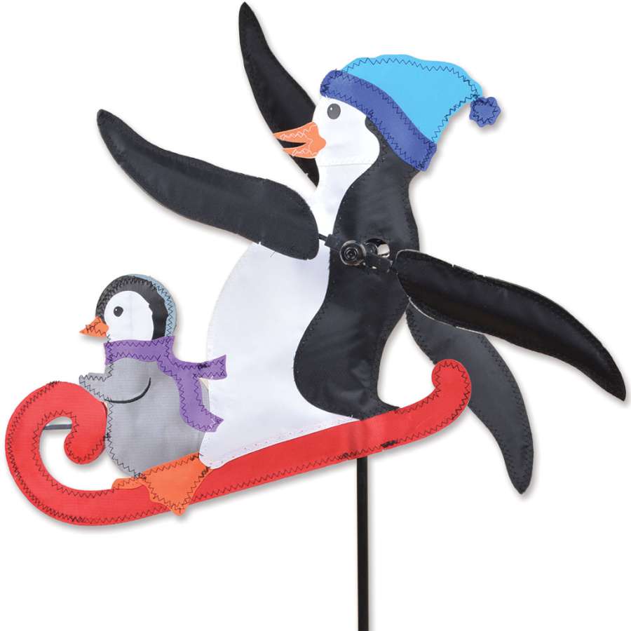 15 in. WhirliGig Spinner featuring colorful SunTex fabric wings spinning in a gentle breeze, enhancing garden decor.