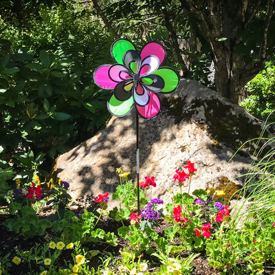 15'' Domino Windee Wheelz and Flower Spinner displaying vibrant flower and wheel designs, swirling in the garden under gentle breezes.