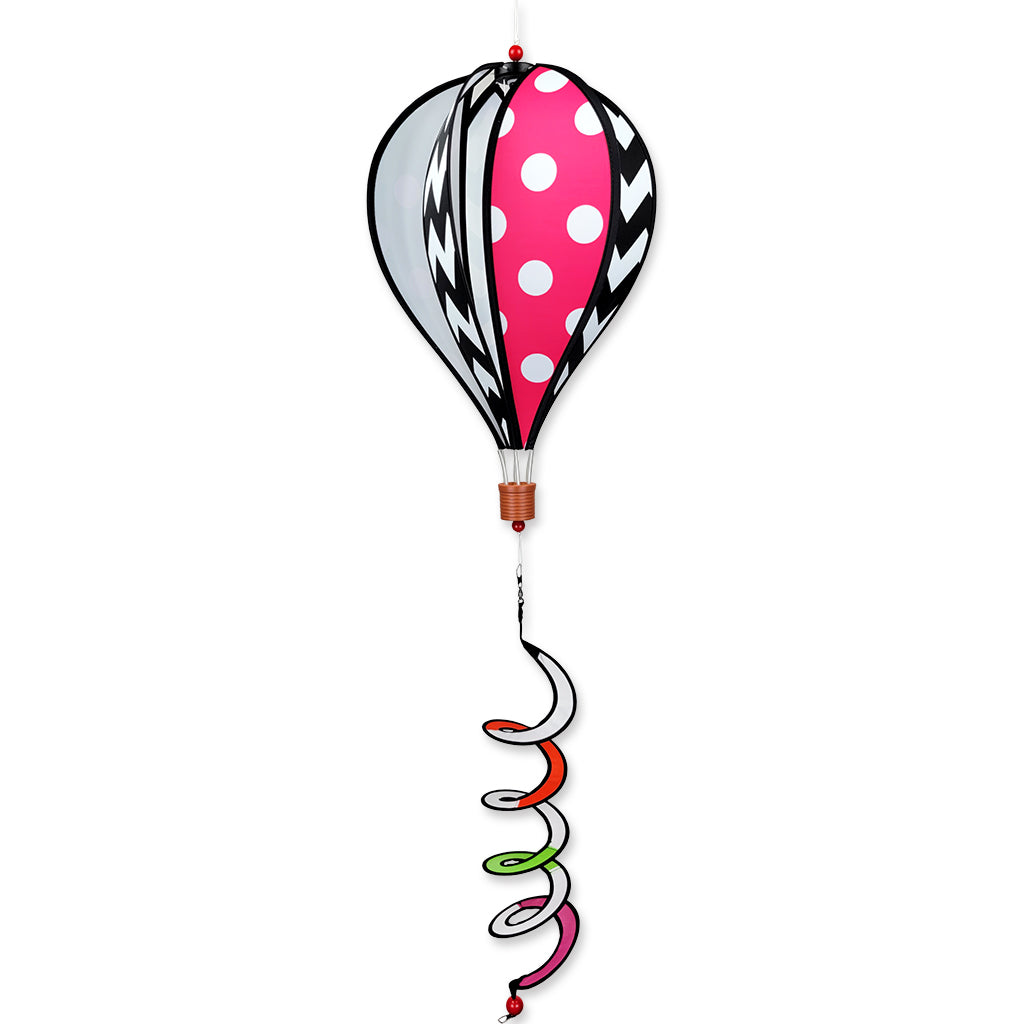 16 in. Hot Air Balloon - Chevron hanging in a garden setting, displaying vibrant colors and spinning gently in the breeze.
