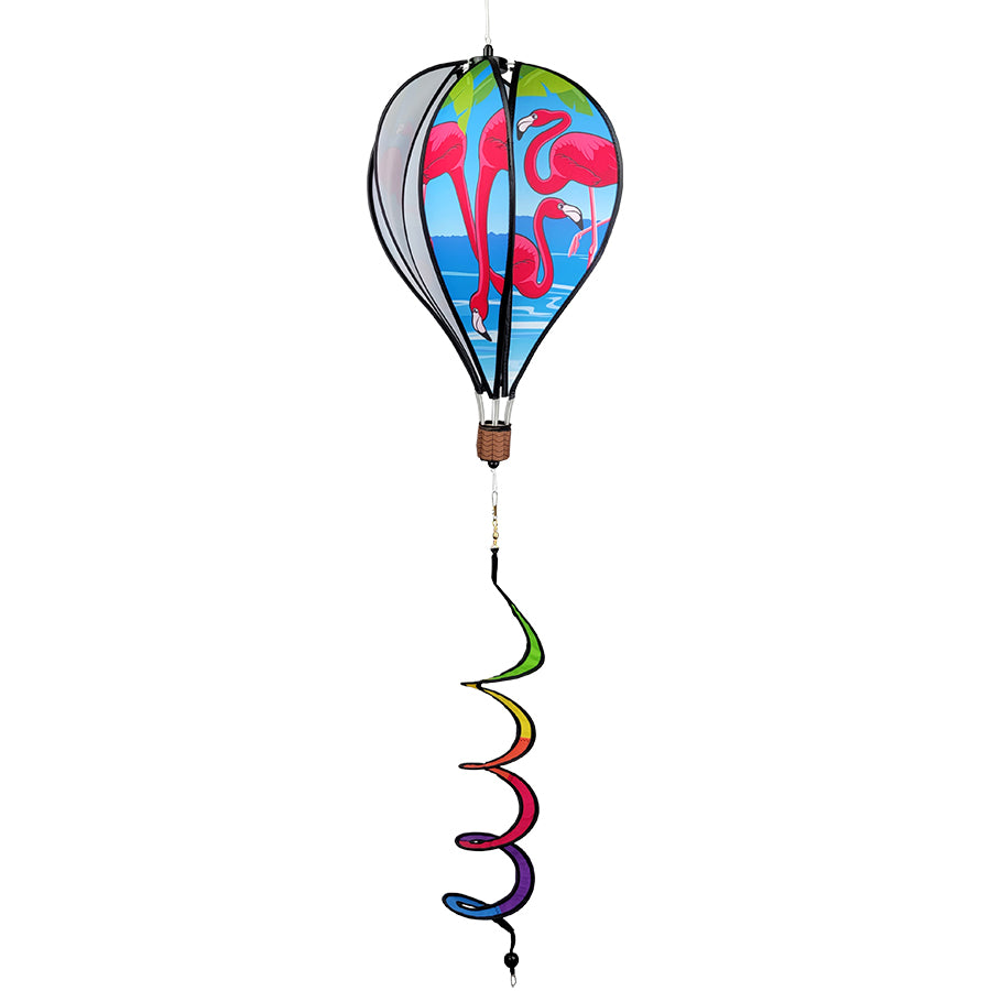 16 in. spinning hot air balloon featuring vibrant flamingos, beautifully displayed in a colorful garden setting, ready to enhance outdoor decor.