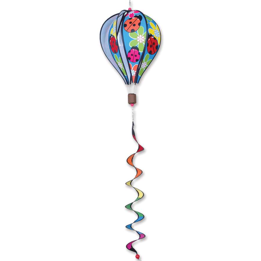 16 in. Hot Air Balloon - Ladybug, featuring vibrant ladybug design, spinning gently in an outdoor garden setting, bringing colorful charm.
