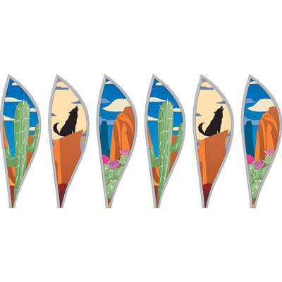 Vibrant 16 in. Hot Air Balloon in Southwestern design spinning gracefully outdoors with colorful twister tail in a garden setting.