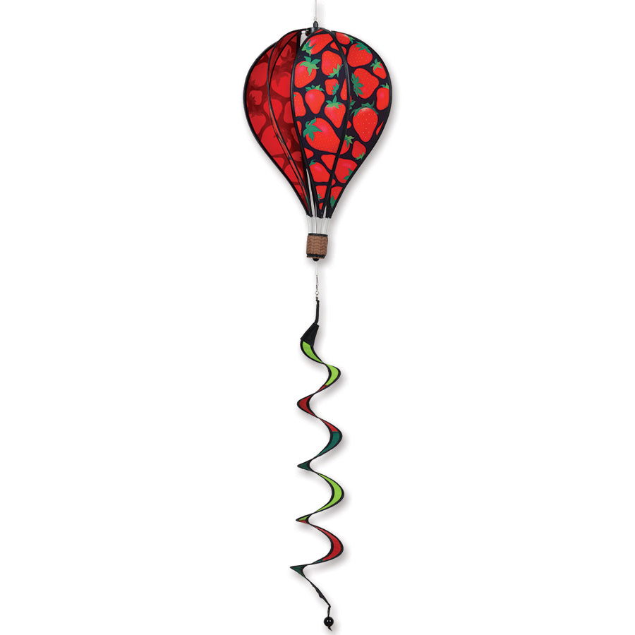 16 in. Hot Air Balloon with vibrant strawberry design spinning gently in the breeze, adding charm to an outdoor setting.