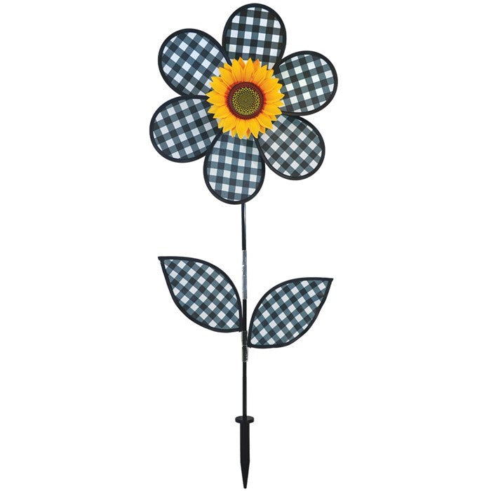 16-inch Gingham Flower with Leaves garden spinner with black gingham petals and leaves, rotating gently in the breeze on a pole.