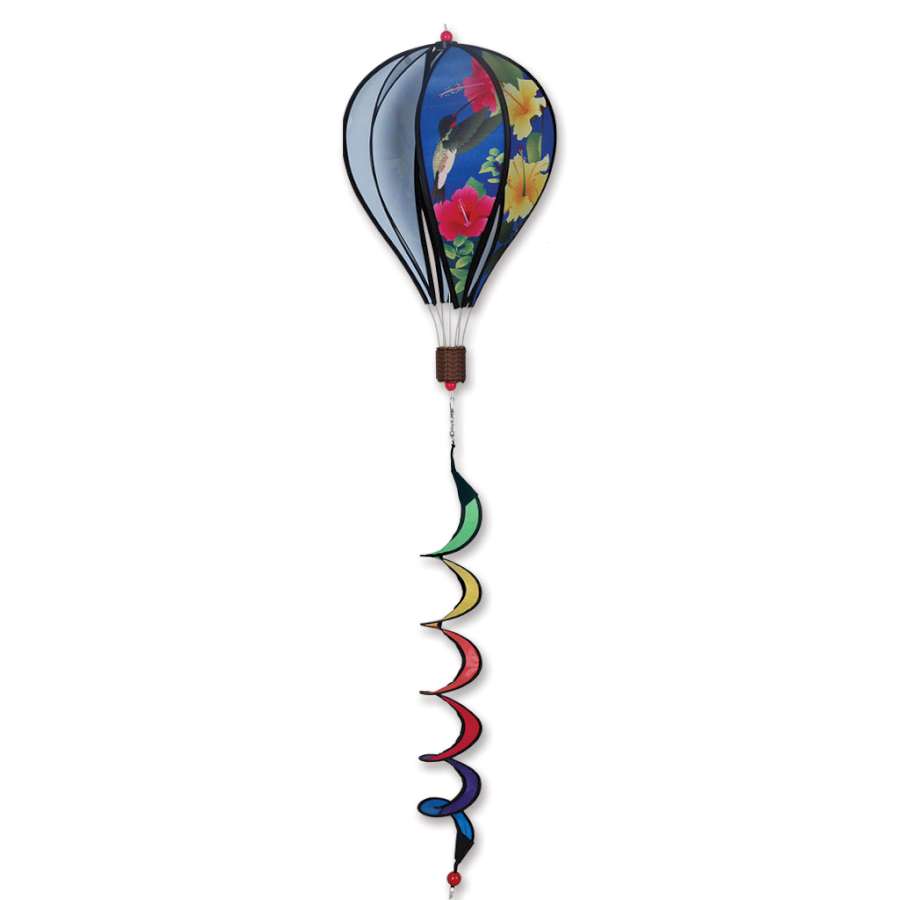 16 in. Hot Air Balloon featuring colorful hummingbirds, spinning gently in an outdoor garden setting against a blue sky.