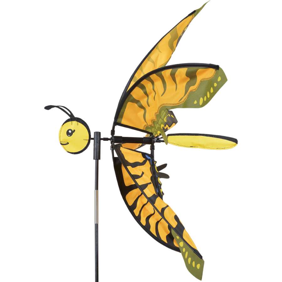 17 in. Swallowtail Butterfly Spinner in vibrant colors spinning gently in the wind, adding beauty to an outdoor garden setting.