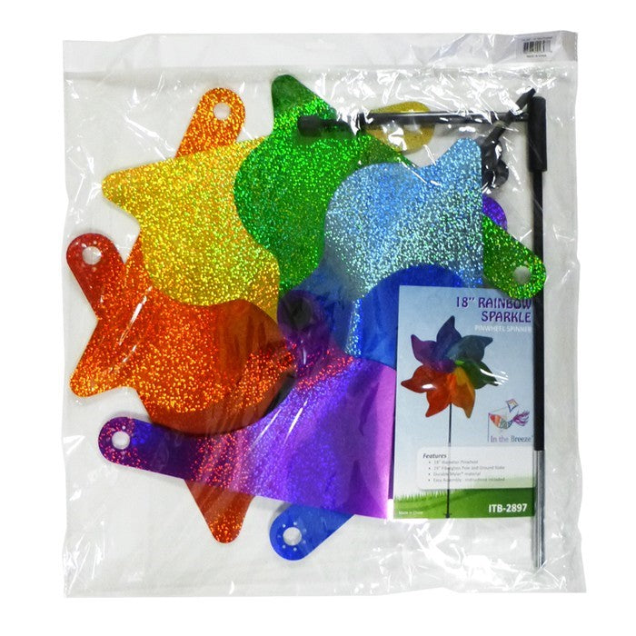 18-inch Rainbow Sparkle Pinwheel Spinner made of Mylar with vibrant colors spinning in the wind on a garden pole.