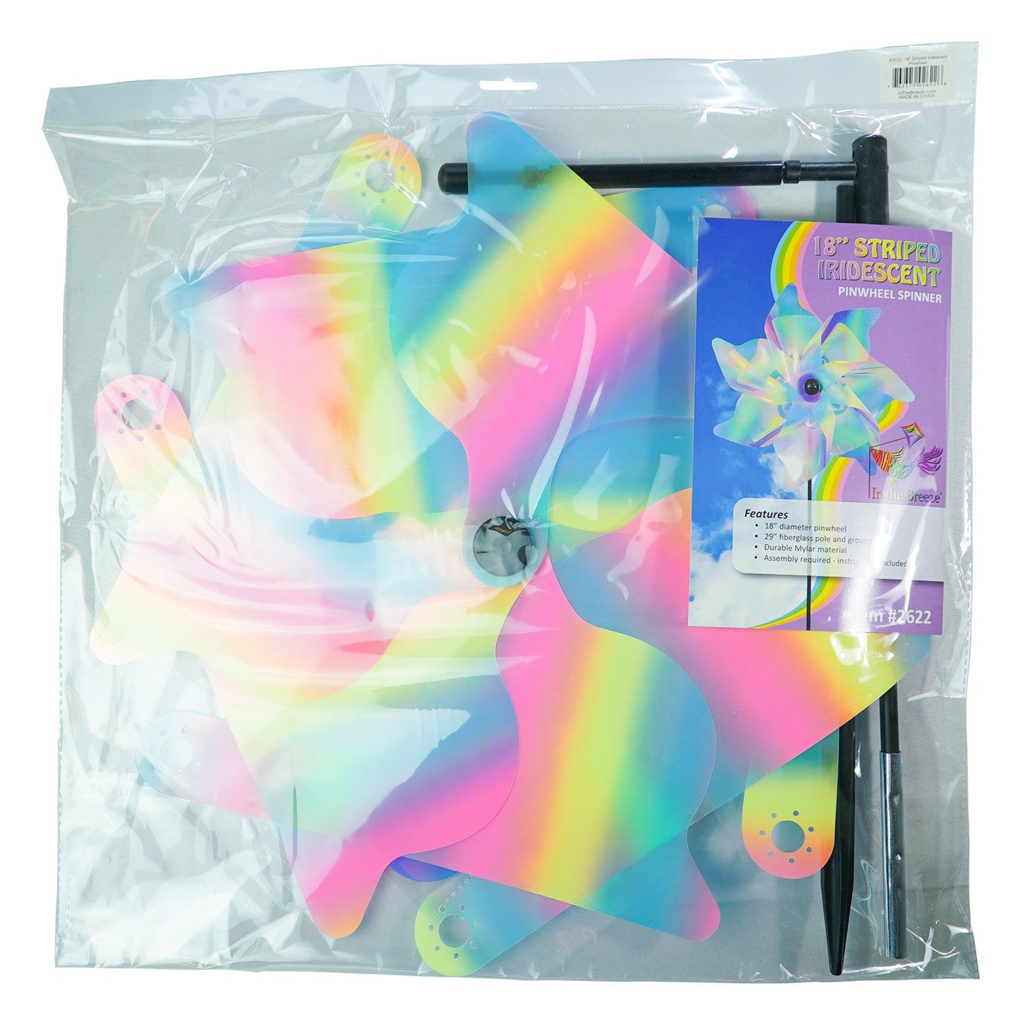 18-inch striped iridescent pinwheel spinner made of durable Mylar, vibrant pastel colors, displayed outdoors in a garden setting.