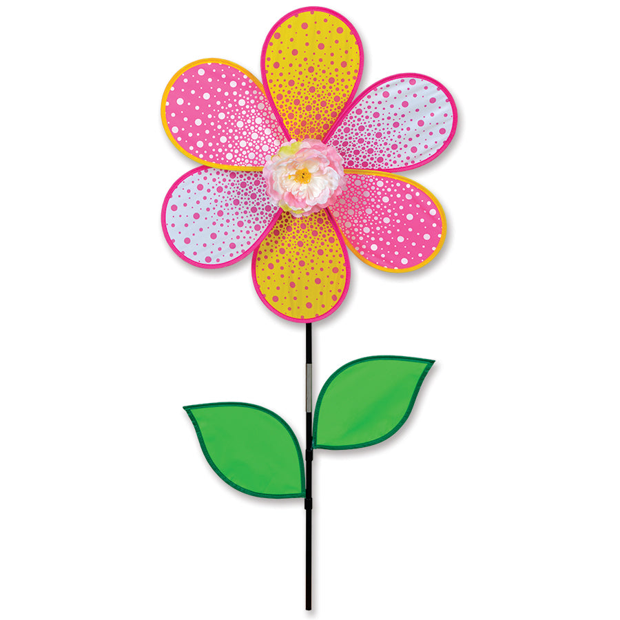19 in. Flower Spinner - Peony with colorful petals spinning gently in an outdoor garden setting, adding a vibrant touch to the scenery.