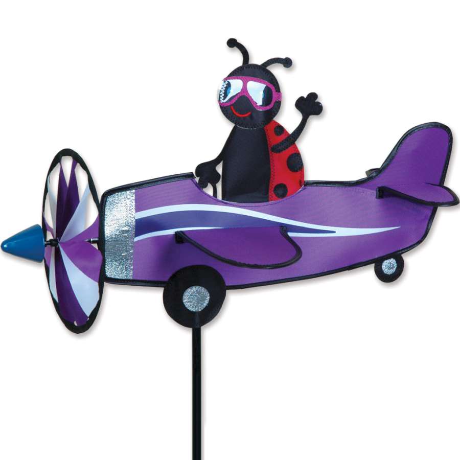 19 in. tall Pilot Pal Spinner in the shape of a ladybug, spinning cheerfully in a garden setting surrounded by flowers.