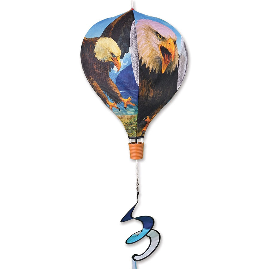 19 in. Pop-Open Hot Air Balloon featuring a Bald Eagle design spinning in the breeze on a porch, showcasing vibrant colors.