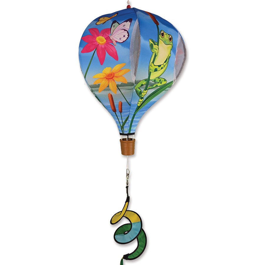 19 in. Pop-Open Hot Air Balloon featuring colorful frogs spins gracefully in the wind, brightening an outdoor deck or porch setting.