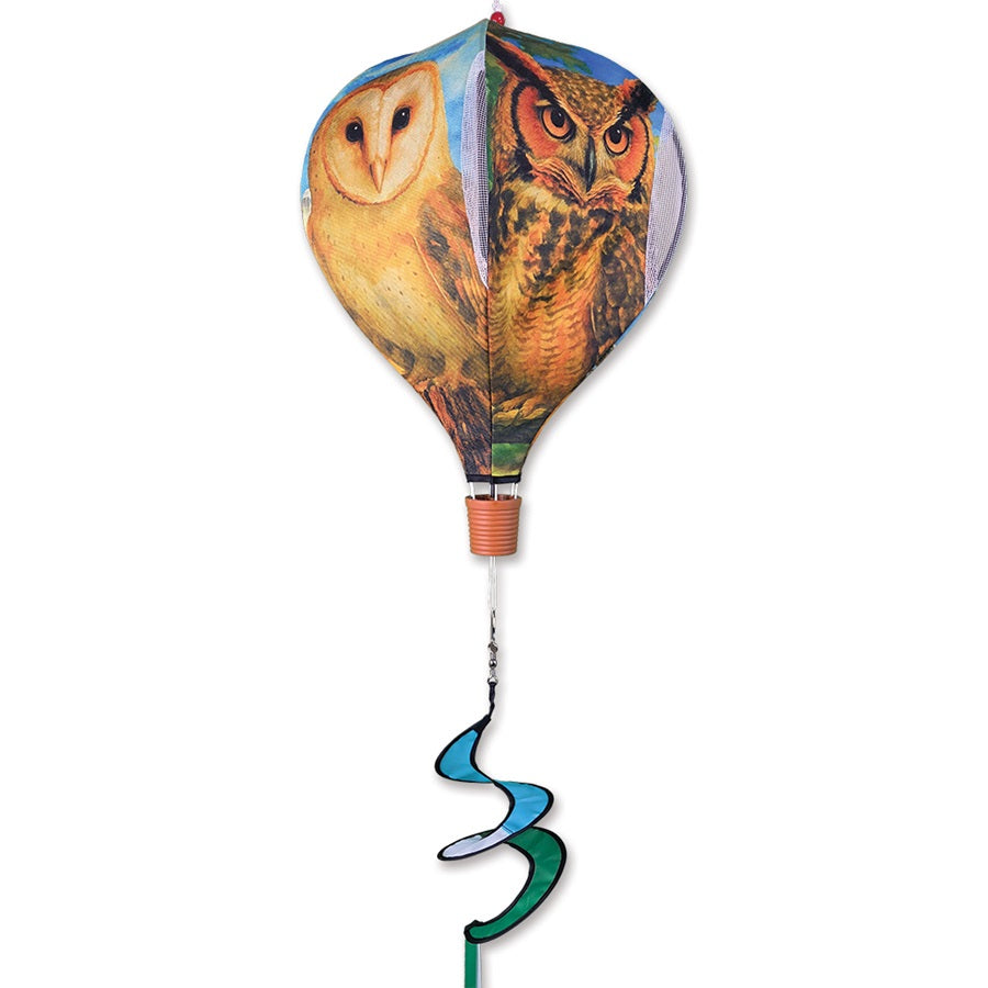 19 inch Pop-Open Hot Air Balloon featuring Owls design, displayed on a porch, spinning gently in the wind, showcasing vibrant colors and whimsical charm.