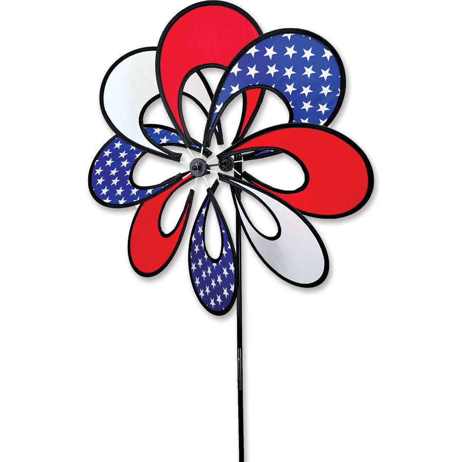 19 in. Single Whirly Spinner with colorful petals spinning in a garden setting, showcasing vibrant outdoor decoration.