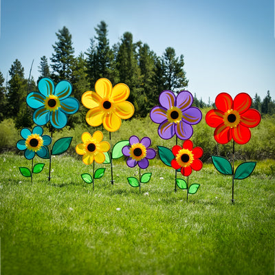 19-inch Purple Sunflower Spinner with six vibrant petals and leaves, rotating gently in a garden setting, designed for outdoor decor.