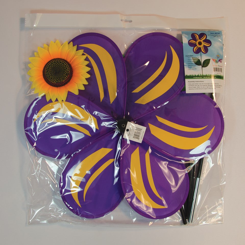 19-inch Purple Sunflower Spinner with six vibrant petals and leaves, rotating gently in a garden setting, designed for outdoor decor.