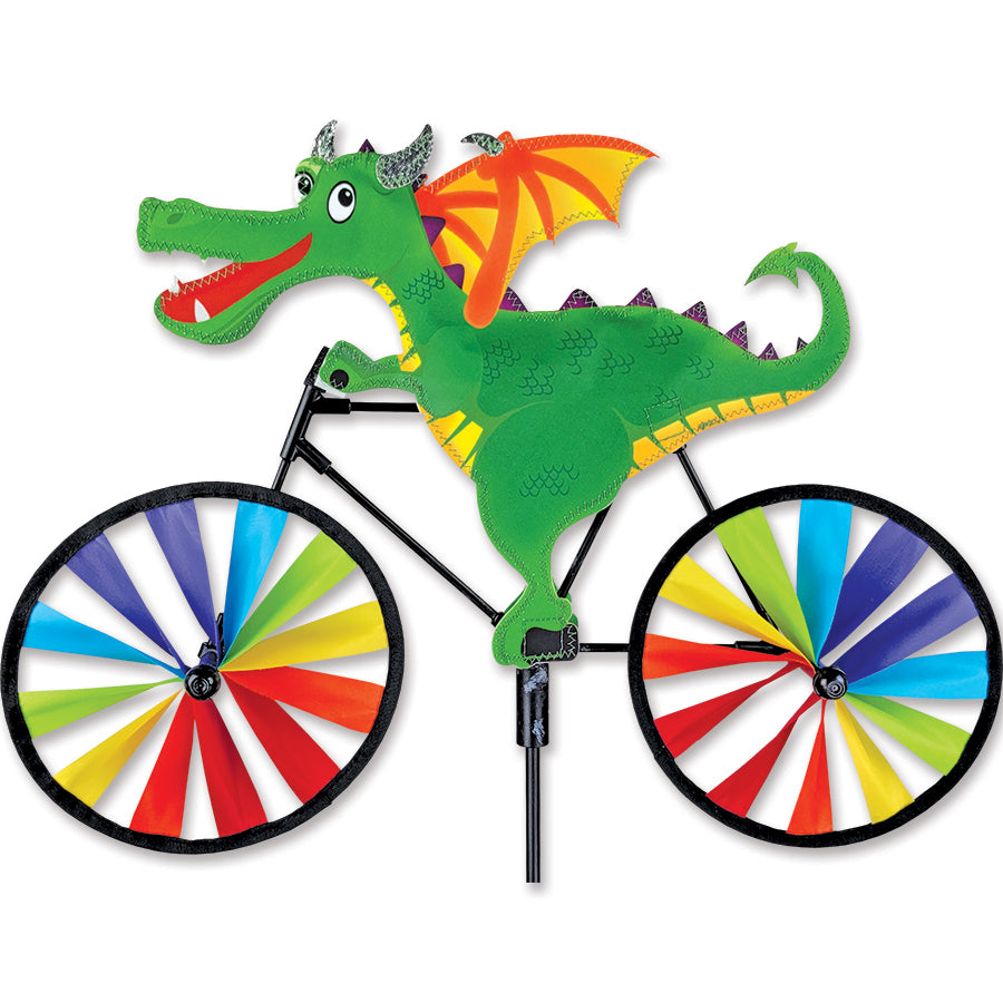 20 in. Bike Spinner - Dragon with colorful dragon design spinning gently in the breeze displayed in a vibrant garden setting.