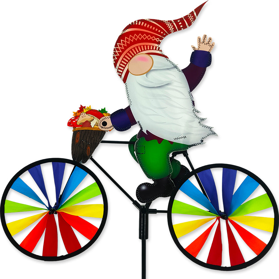 20 in. Bike Spinner featuring a vibrant Forest Gnome design, spinning in the breeze in a colorful garden setting.