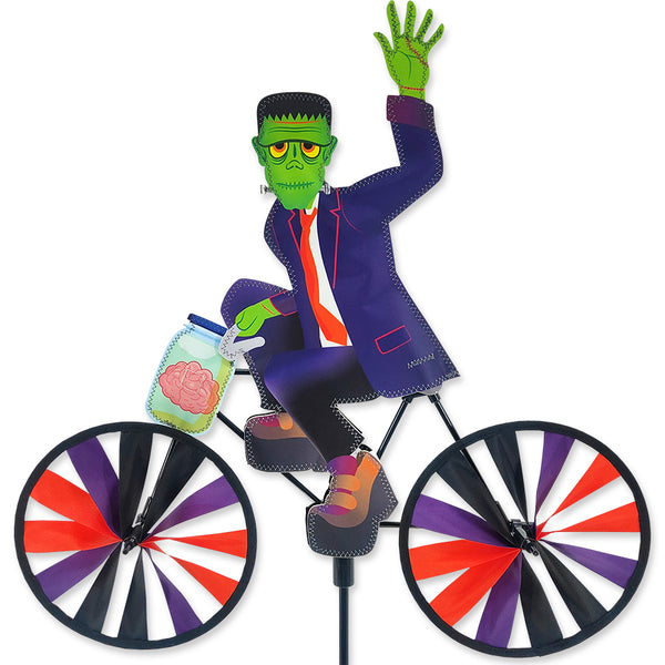 20 in. Bike Spinner - Frankenstein featuring colorful Halloween design spinning under outdoor sunlight, adding festive charm to any garden.