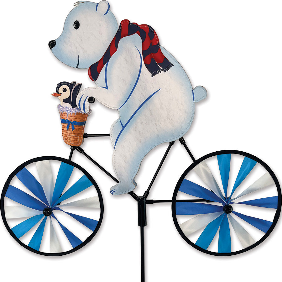 20 in. Bike Spinner - Polar Bear, featuring a cute polar bear design, spinning in a colorful garden setting under the sun.
