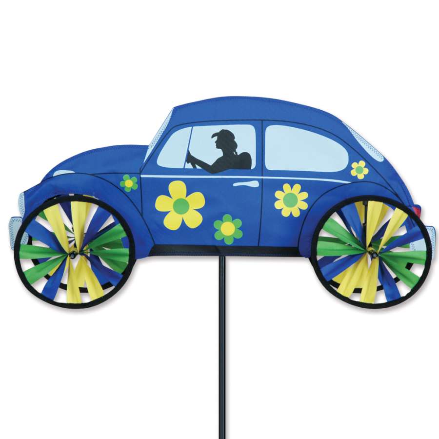 22-inch Hippie Mobile Spinner in blue featuring a vibrant VW Bus design, spinning gently in an outdoor garden setting.