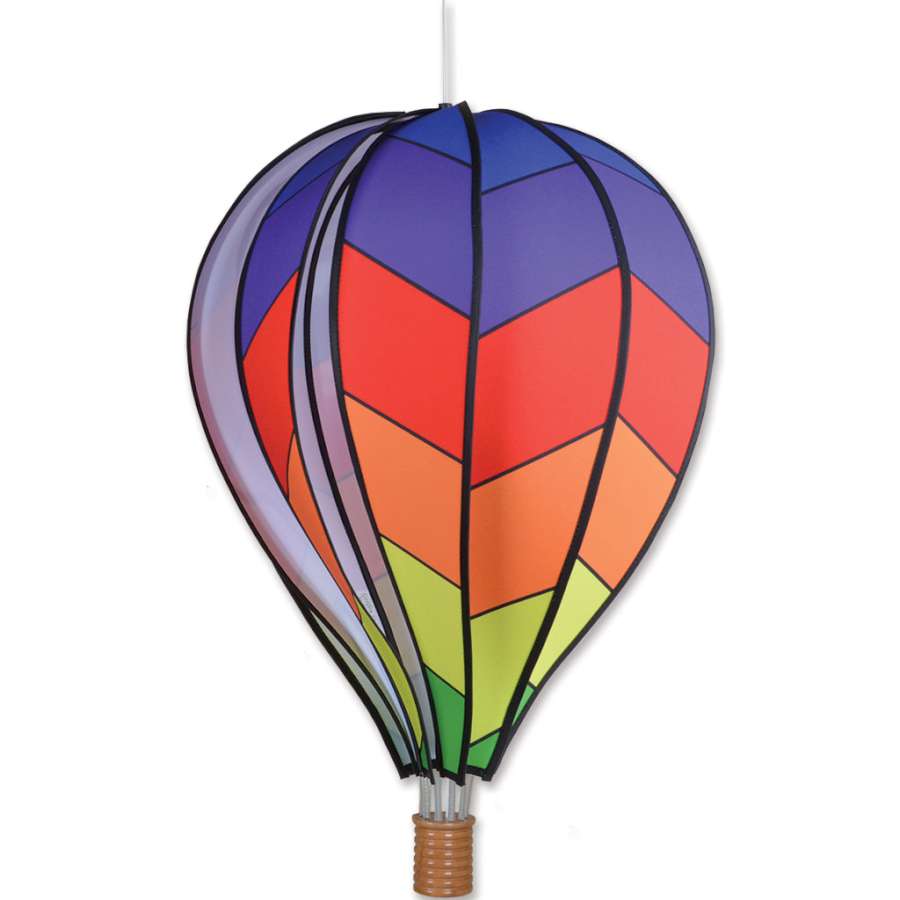 22 in. Hot Air Balloon - Chevron Rainbow spinning in an outdoor setting, showcasing its vibrant chevron colors against the backdrop of greenery.