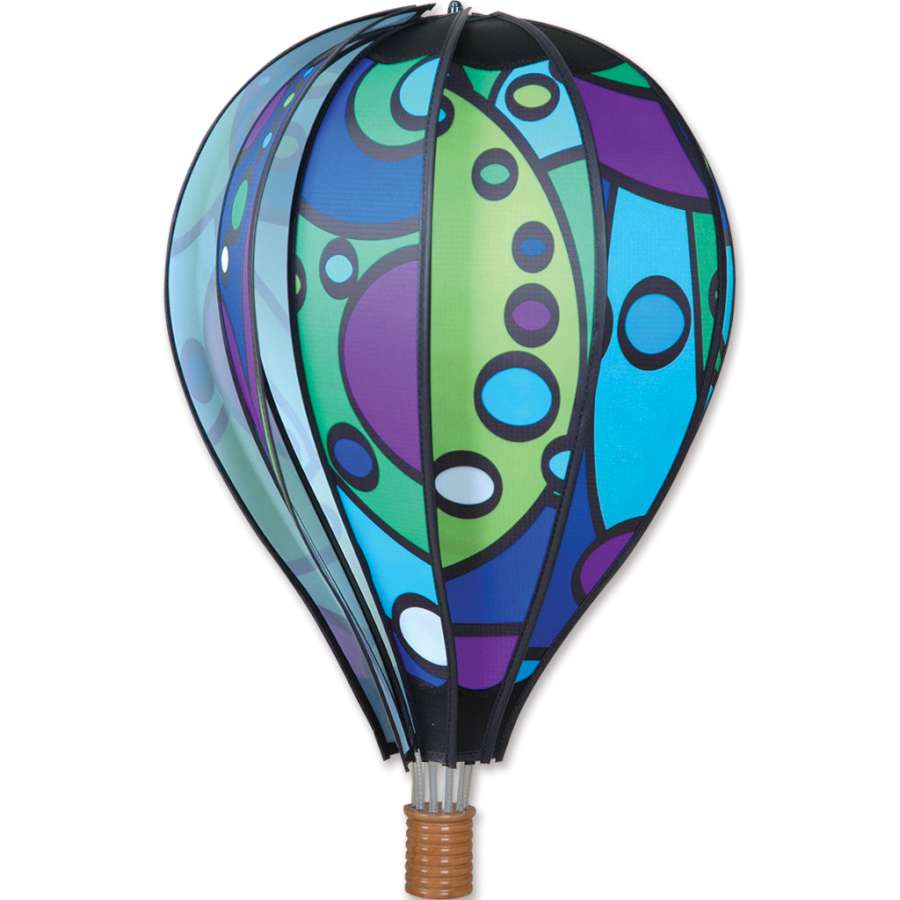 22 in. Hot Air Balloon - Cool Orbit displayed spinning outdoors with vibrant colors, adding whimsical flair to the garden.