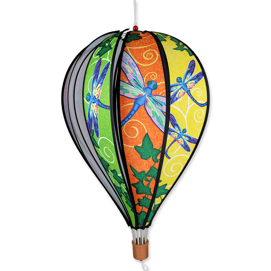 22 in. Hot Air Balloon featuring dragonflies design spinning gently in a garden, adding color and whimsical charm to an outdoor setting.