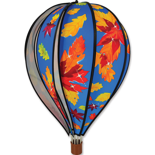 22 in. Hot Air Balloon featuring vibrant fall leaves, gracefully spinning in a garden setting during autumn.
