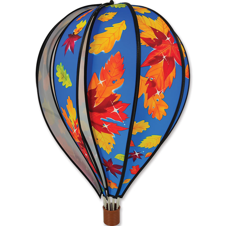 22 in. Hot Air Balloon featuring vibrant fall leaves, gracefully spinning in a garden setting during autumn.