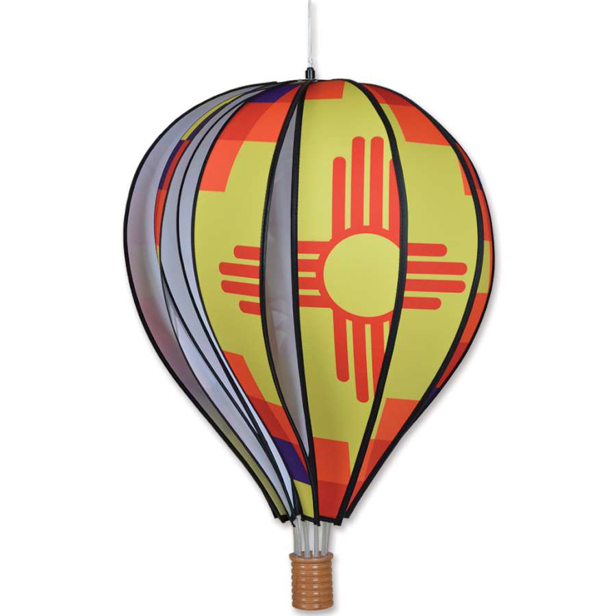 22 inch Hot Air Balloon - New Mexico featuring colorful design, spinning in an outdoor garden setting, adding charm to the space.