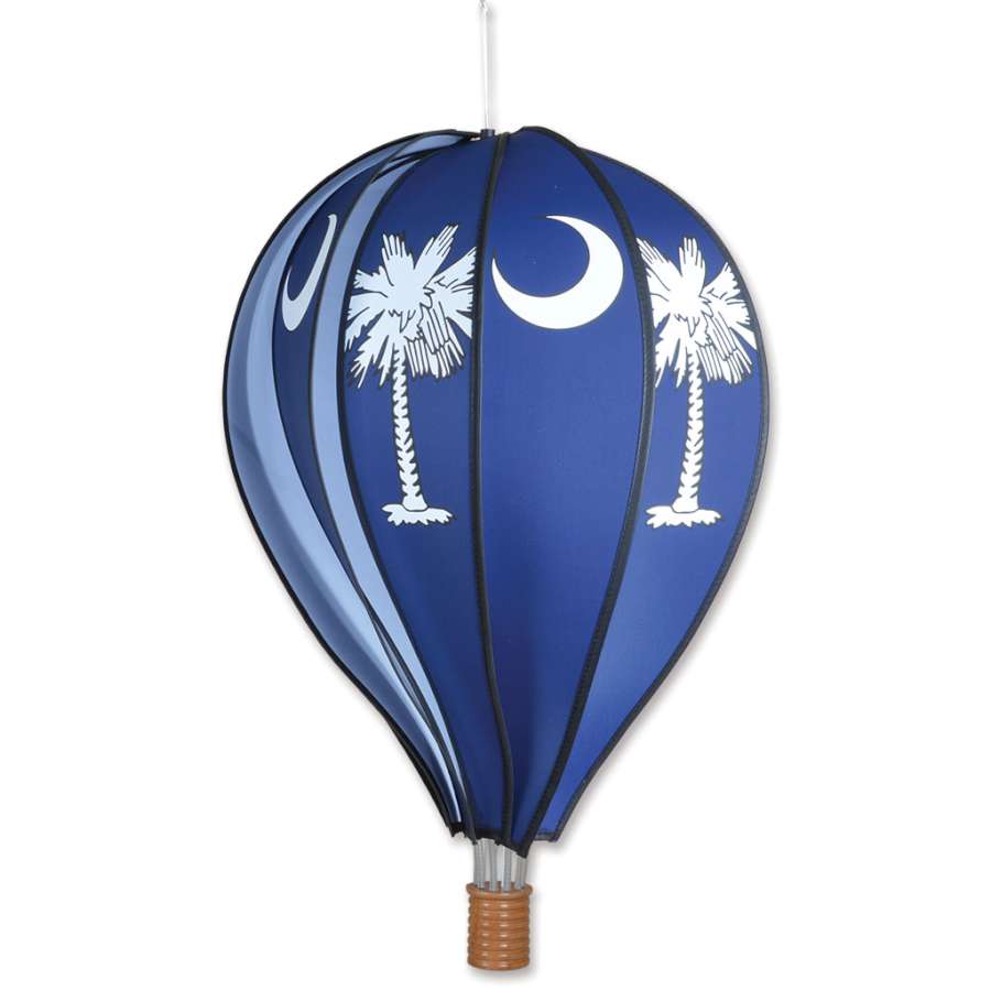22 in. Hot Air Balloon - Palmetto displaying vibrant colors and intricate patterns, spinning gently in a garden setting.