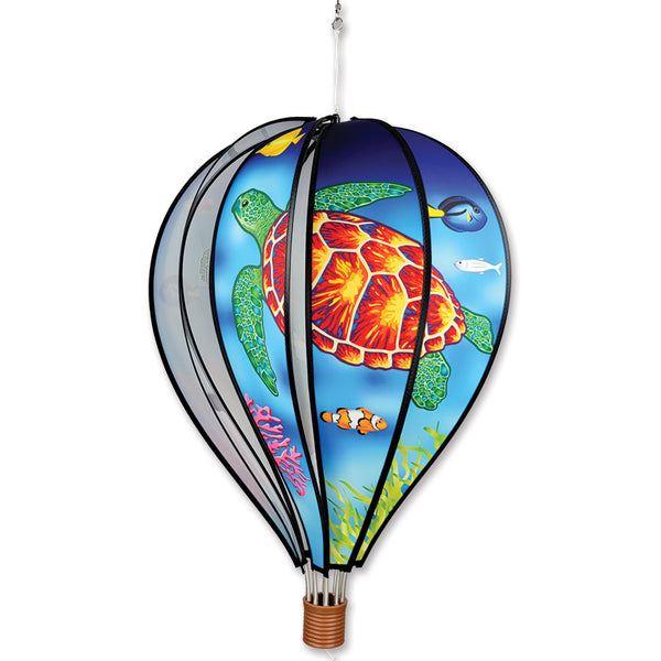 22-inch Hot Air Balloon with vibrant sea turtle designs, spinning gently in the garden, brightening up the outdoor space.